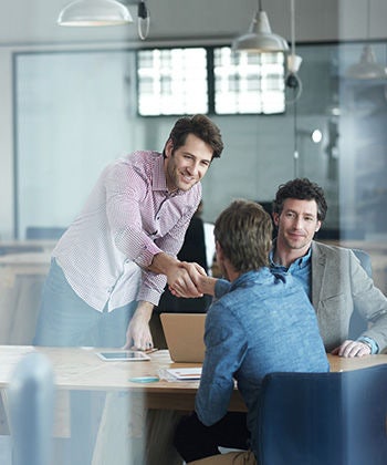 shaking hands in a meeting