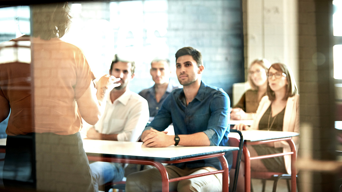 people being taught in a classroom