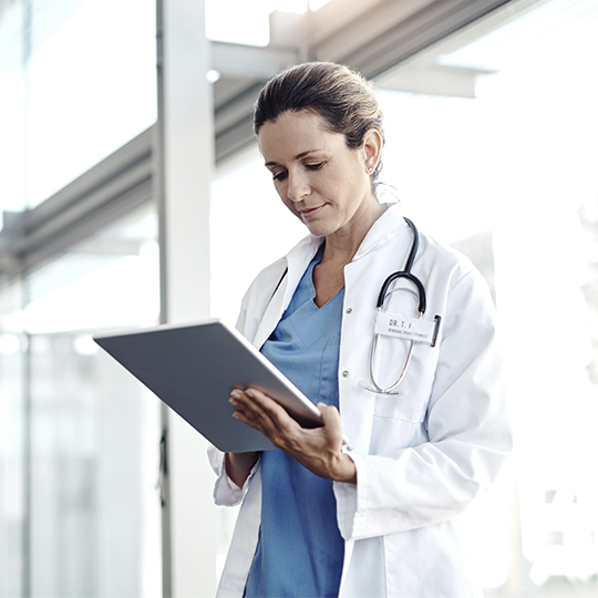 doctor with tablet