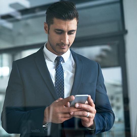 Capture is just one way to streamline processes businessman checking his phone