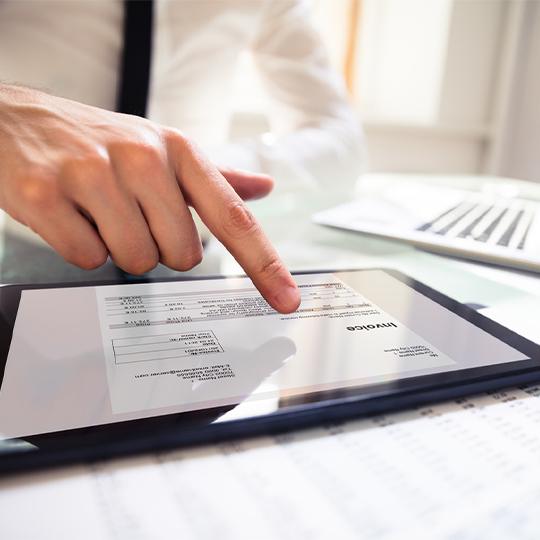 Kyocera Capture Manager hand working with a tablet
