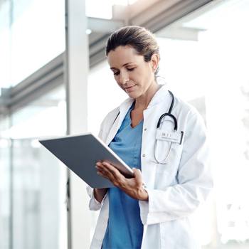 doctor with tablet